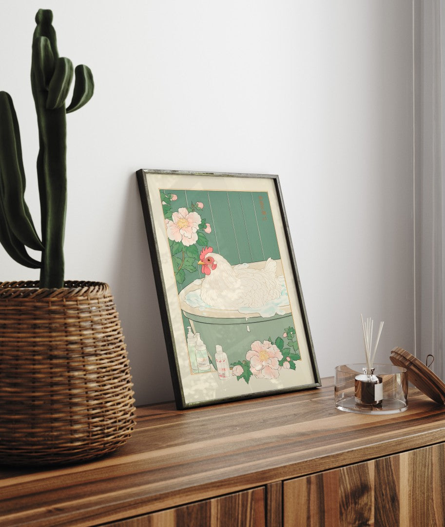 Framed bathroom decor featuring a relaxed chicken in a whimsical Japanese-style soak