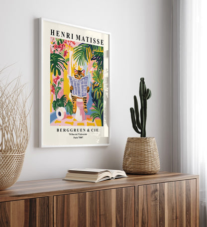 Colorful wall art of a tabby cat in a playful tropical setting.