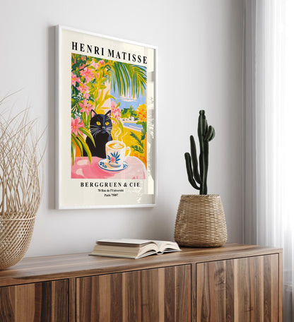 Framed whimsical black cat with floral coffee cup surrounded by vibrant plants art print