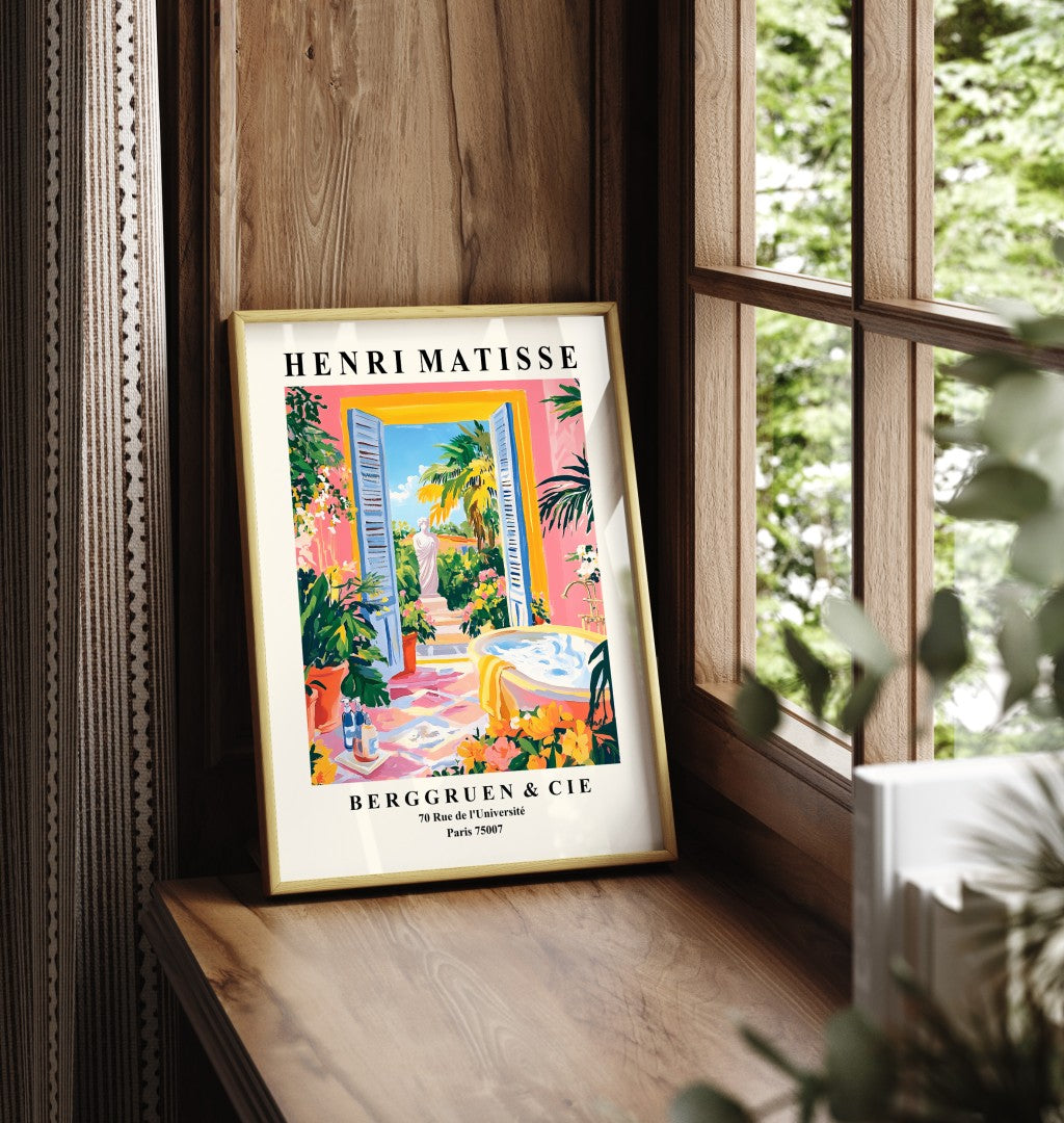 Framed art print showing yellow bathtub by open shutters with garden view