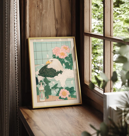 Framed bathroom wall art of a bald eagle soaking in a tranquil floral setting