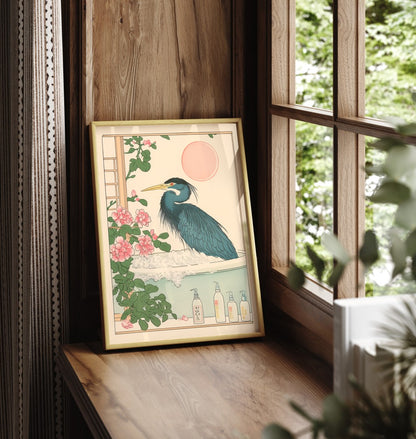 Framed bathroom wall art of a blue heron in a serene Japanese-style floral soak