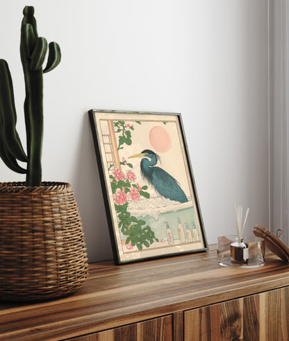 Framed bathroom decor featuring a tranquil blue heron in a warm floral bath scene