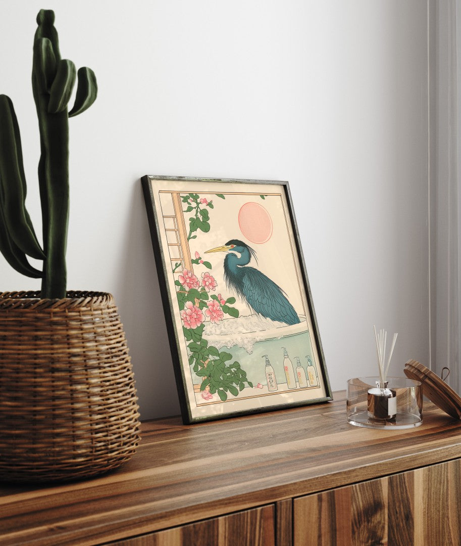 Framed bathroom decor featuring a tranquil blue heron in a warm floral bath scene